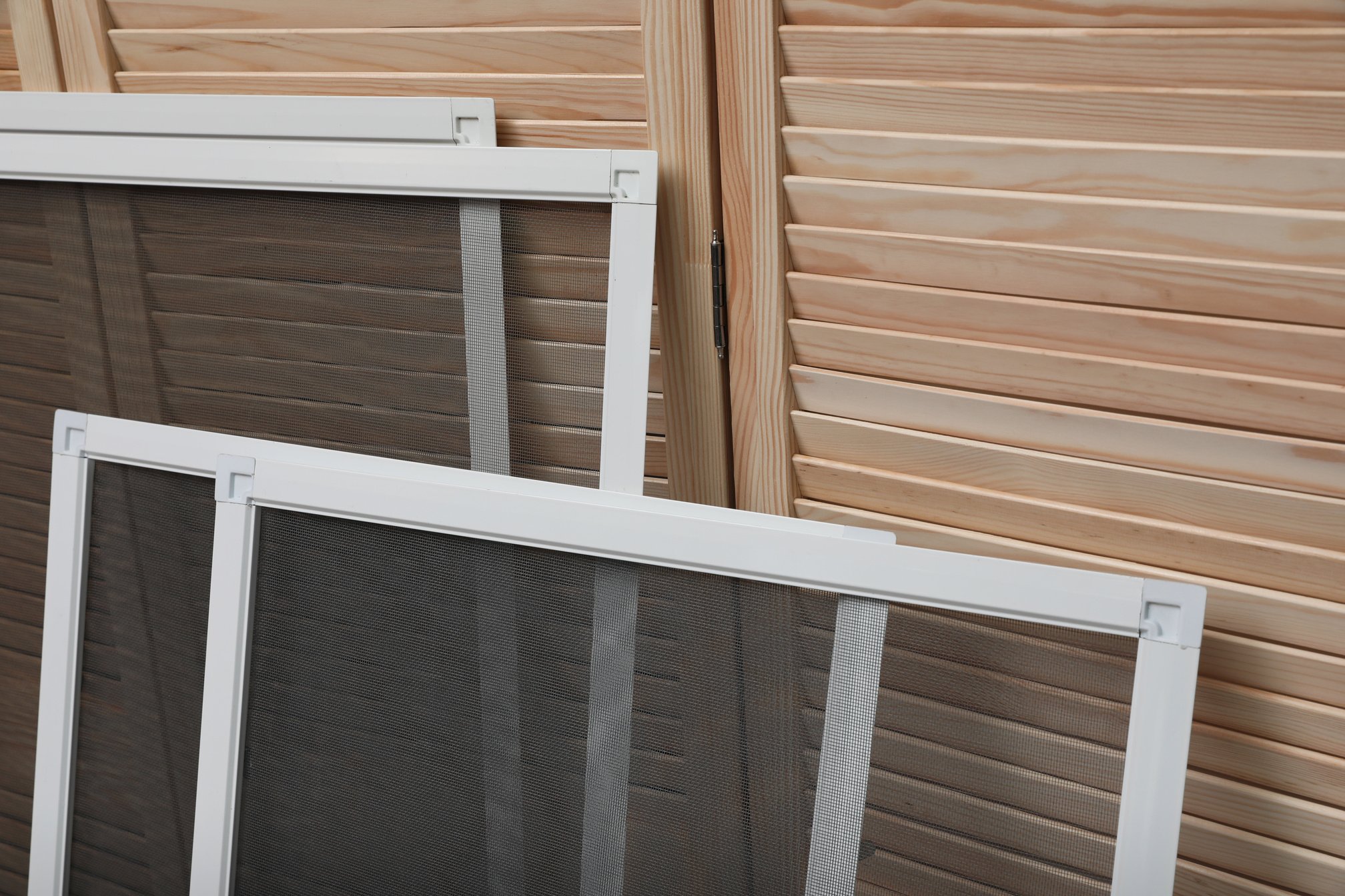Set of Window Screens near Wooden Folding Screen
